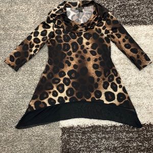 Susan Lawrence brand shark-bite leopard pint top with cowl neck.